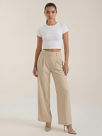 Weite Bundfaltenhose mit hohem Bund in hellem Beige, gerade weit fallend